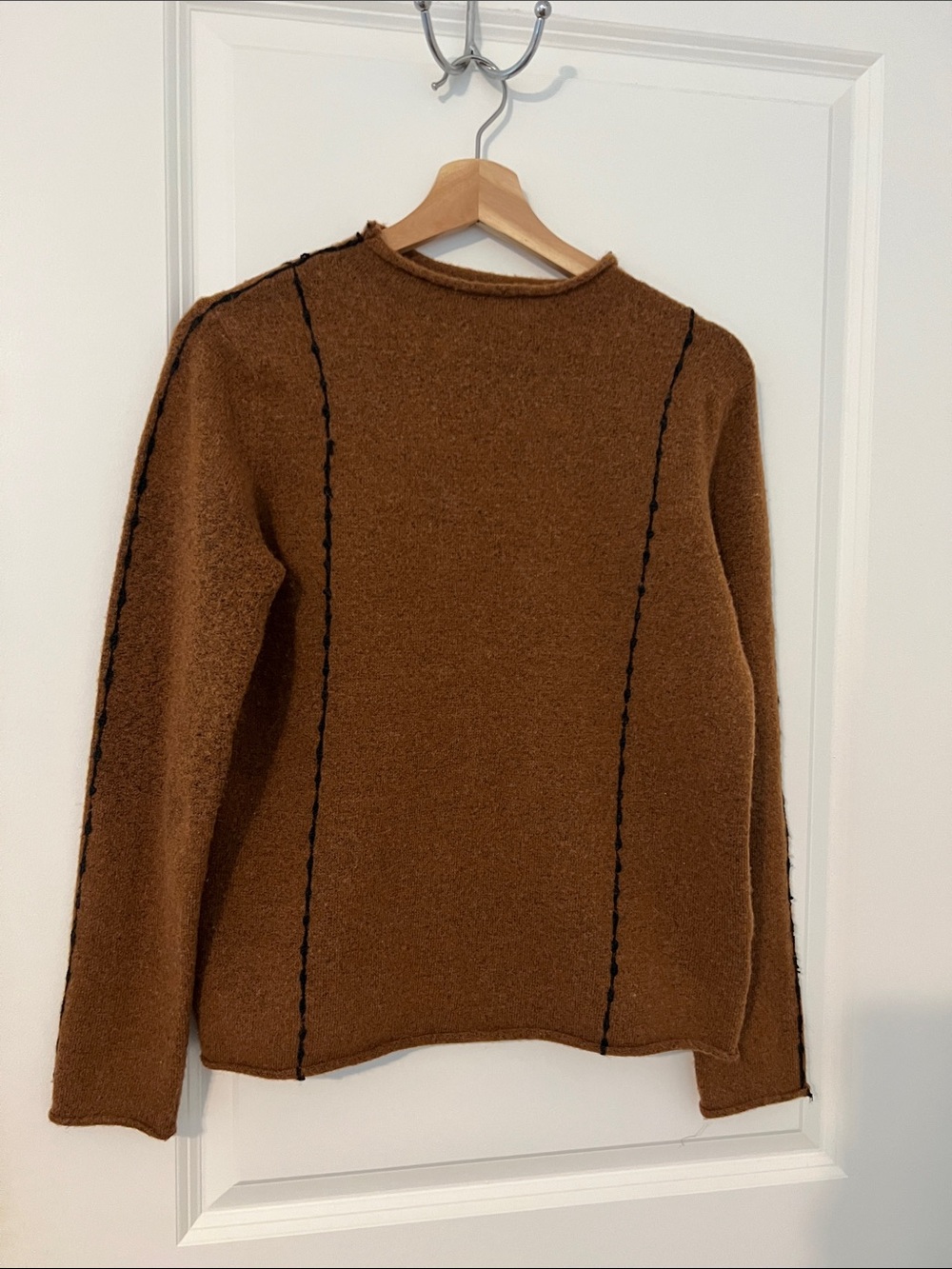 The Korner by Anthropologie sweater.